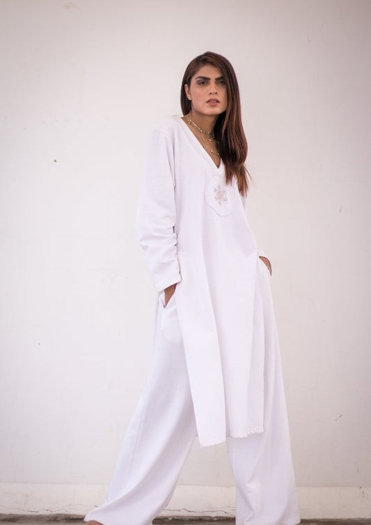 Luxury knits long shirt in white.