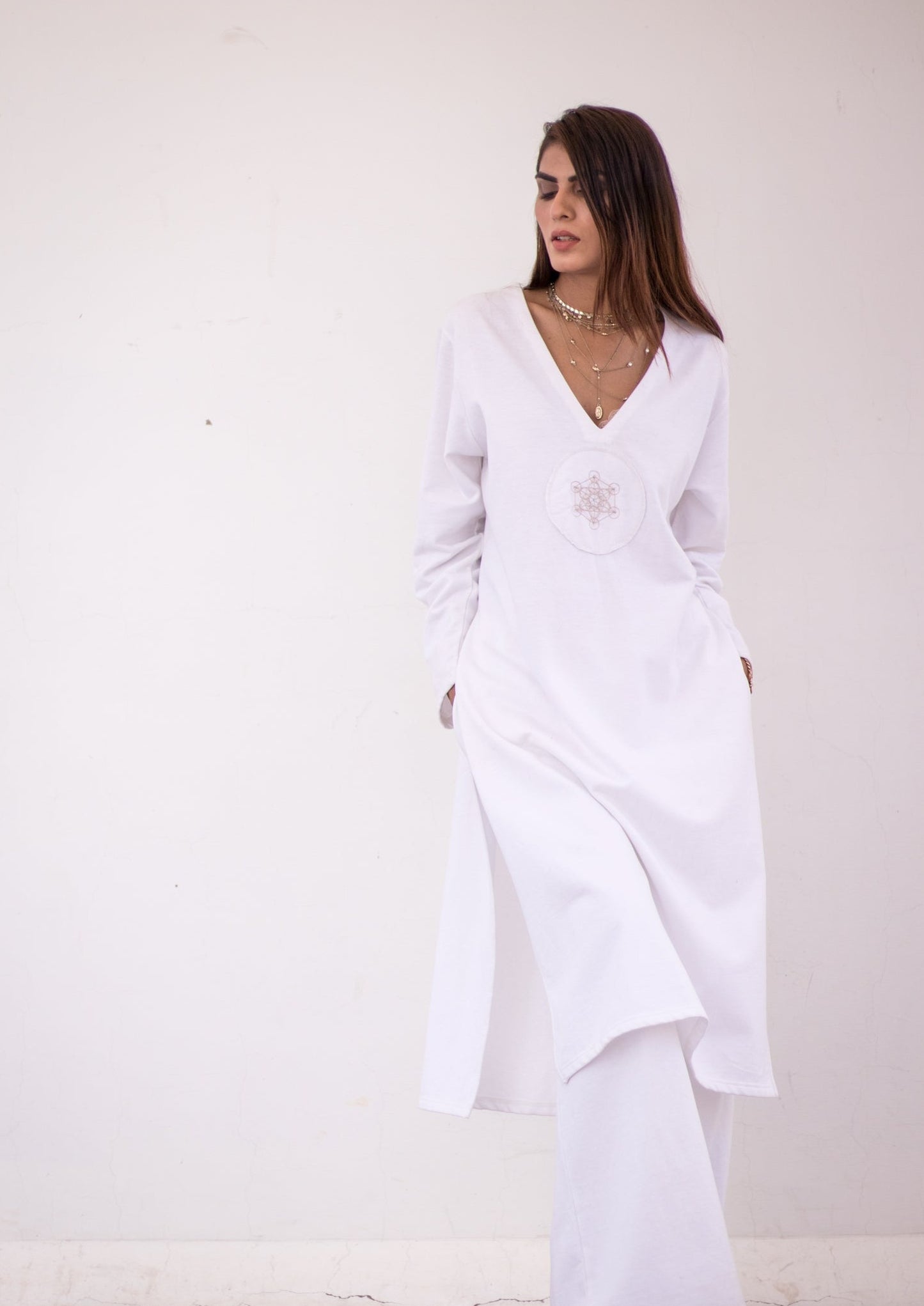 Luxury knits long shirt in white.