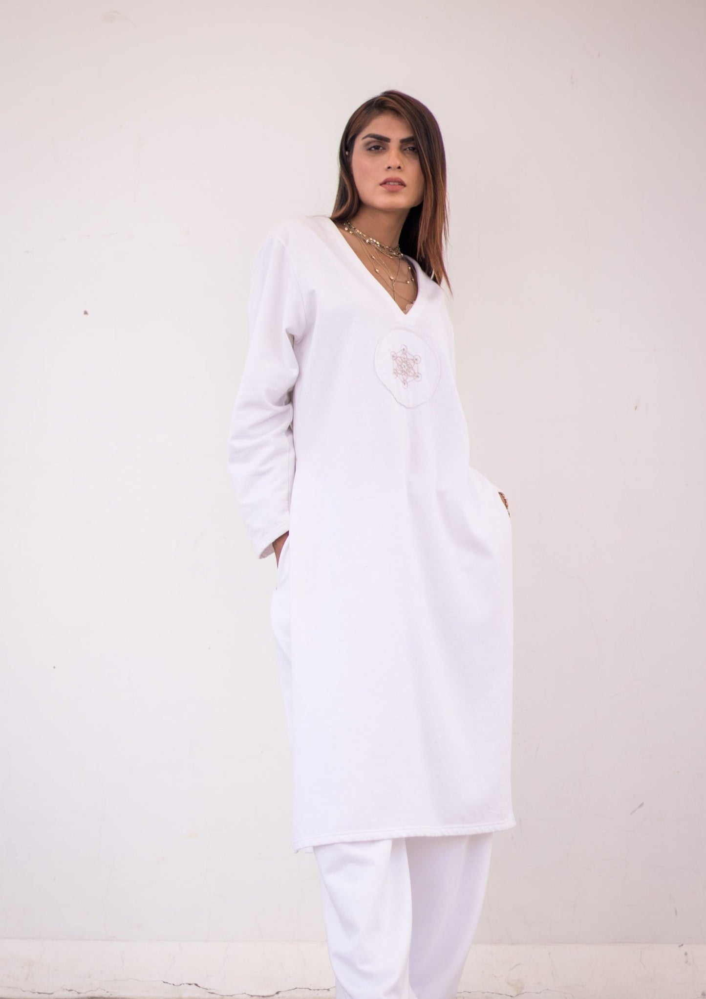 Luxury knits long shirt in white.