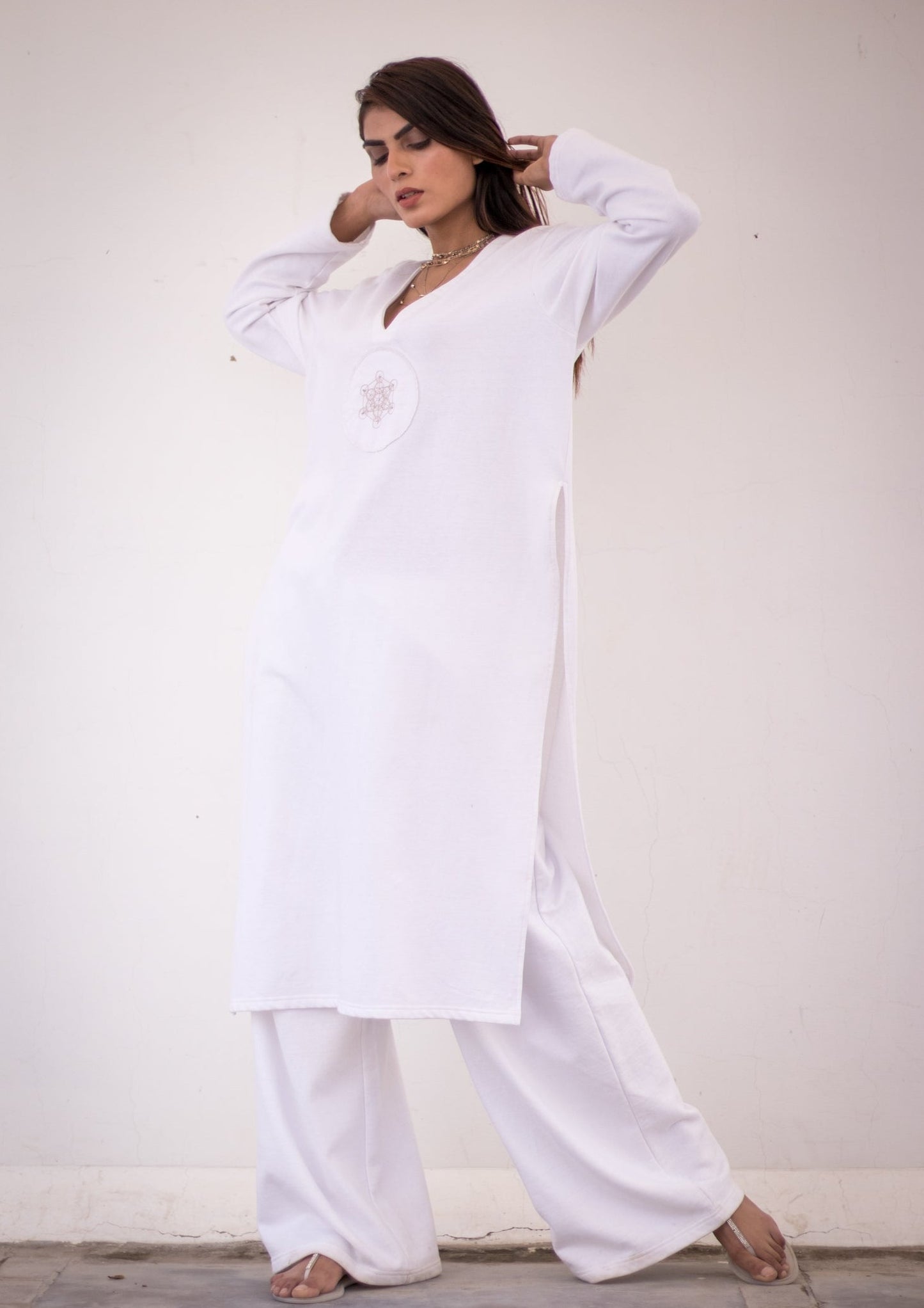 Luxury knits long shirt in white.