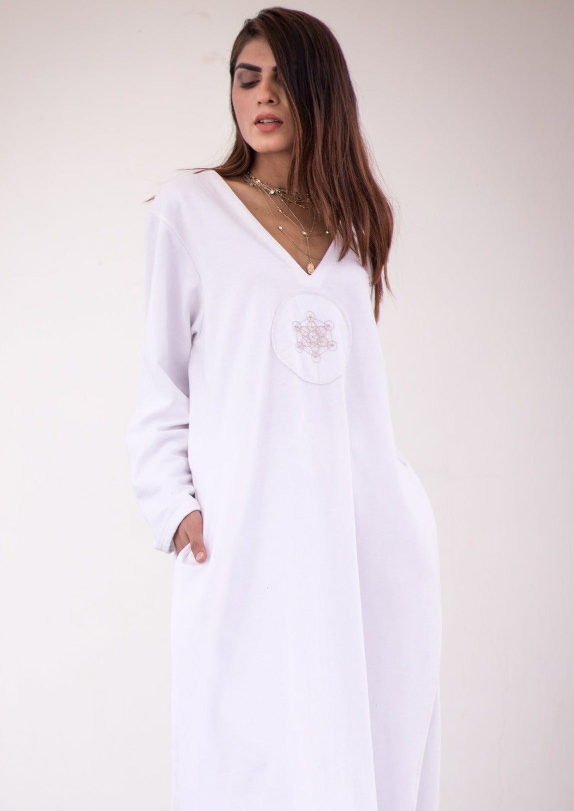 Luxury knits long shirt in white.